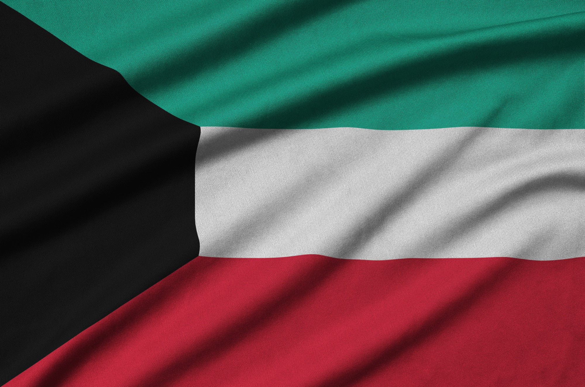 من نحن 8 Kuwait flag is depicted on a sports cloth fabric with many folds. Sport team waving banner
